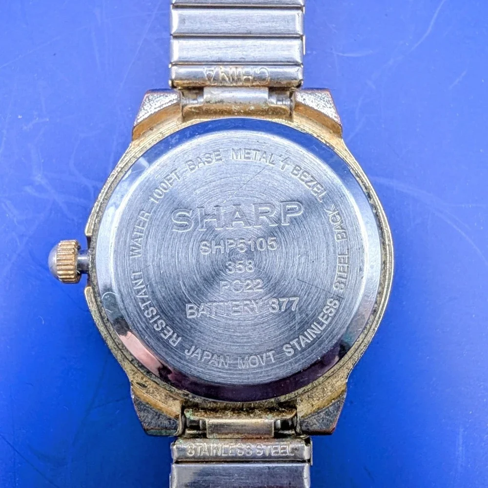 Sharp Ladies Watch Date Gold tone Stretch Band 5105 Vintage‎ New Batterry